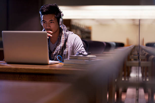 Learner working through an online course on a laptop